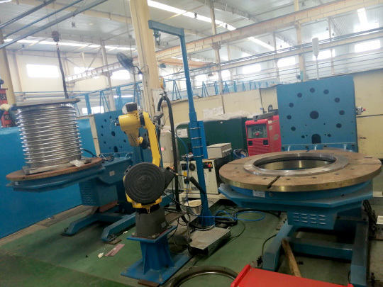 Welding Robot System for Dual Workbench Corrugated Pipes